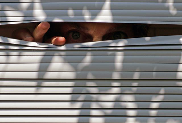 Peeking through blinds