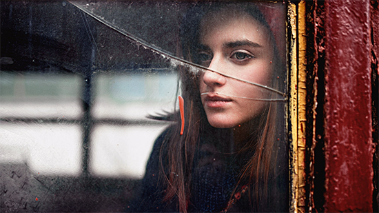 Woman at broken window