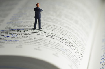 Man standing on book