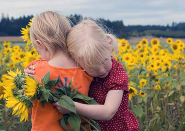 Little girls hugging