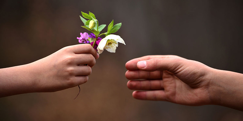 Handing flowers